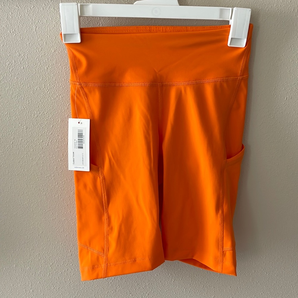 Outdoor Voices Zoom 8” Shorts in Clementine